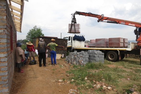 Roof tiles delivered to Elias' showhouse.