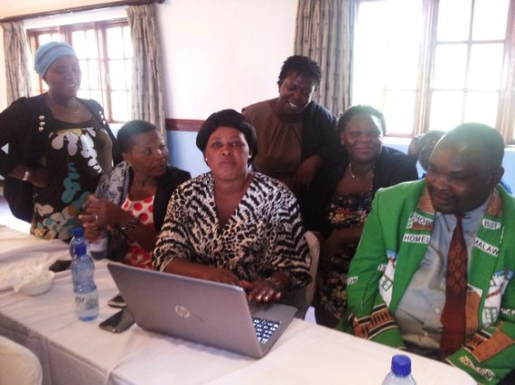 Malawi Federation members work with the online data platform. 
