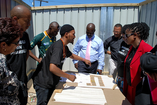 Deputy Minister of Human Settlements, Ms. Kota-Fredericks, visits the newly re-blocked Mtshini Wam in 2012