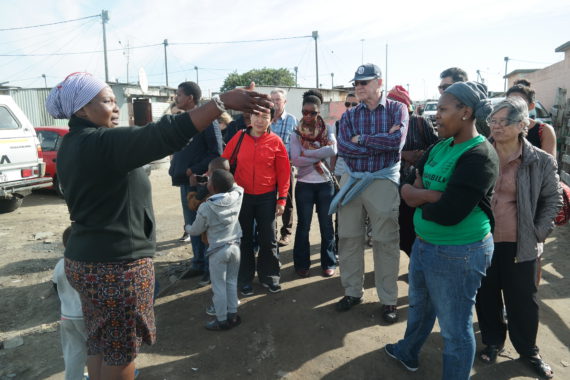Community leader of TT Section, Site B Khayelitsha welcomes Somsook to her settlement